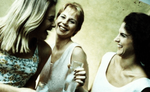 three women laughing three women laughing